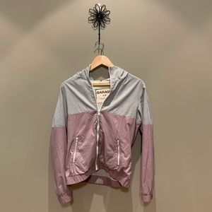 grey and purple windbreaker